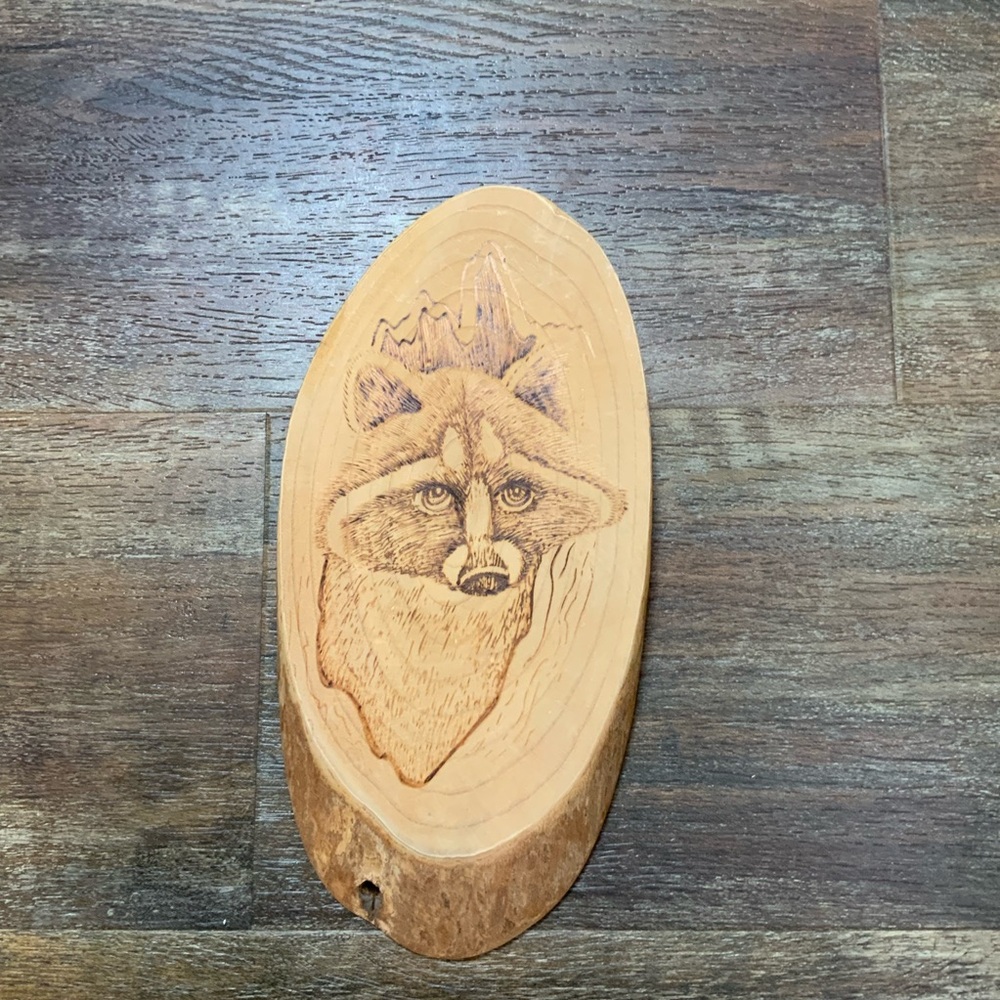 Raccoon wall sculpture burn etched wood slab plaque